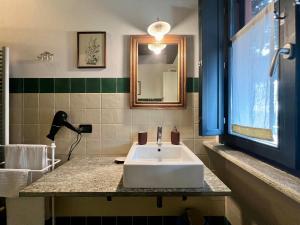 Kúpeľňa v ubytovaní Le Serre Suites & Apartments