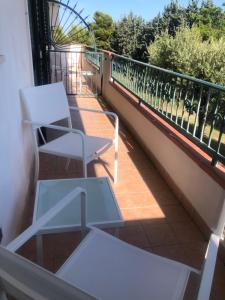 En balkon eller terrasse på Casa vacanze 365 - verde