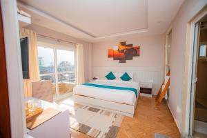 Uma cama ou camas num quarto em Majheri Resort and Spa