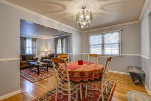 a dining room with a table and chairs at Maryland Abode with Patio Near Baltimore Harbor in Baltimore