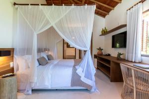 Кровать или кровати в номере Hotel Vila São João +176 фотографий