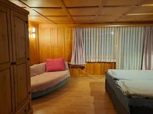Postel nebo postele na pokoji v ubytování Haus Dani Danis