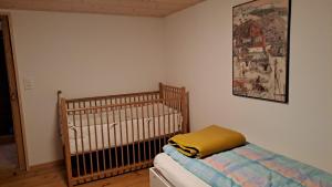 Postel nebo postele na pokoji v ubytování Haus Dani Danis