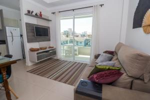 Area tempat duduk di 377 - Belissimo apartamento na praia de Bombas
