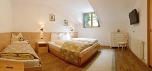 Postel nebo postele na pokoji v ubytování B&B Appartments Cudlea