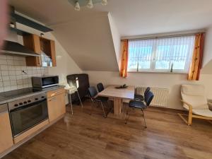 Кухня или кухненски бокс в Ferienwohnung Schupfer