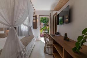 Телевизор и/или развлекательный центр в Hotel Vila São João