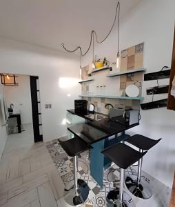 Kuchyň nebo kuchyňský kout v ubytování okeyloft Coyhaique 6 + 10 fotografií