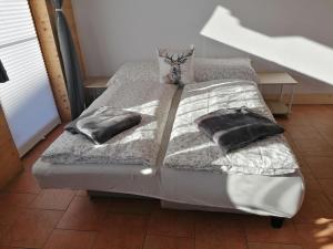Postel nebo postele na pokoji v ubytování Ferienwohnung Mireille