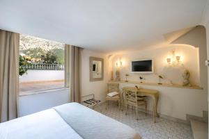 Μια τηλεόραση ή/και κέντρο ψυχαγωγίας στο My Exclusive Italy - Villa in Positano with luxury spa & amazing view
