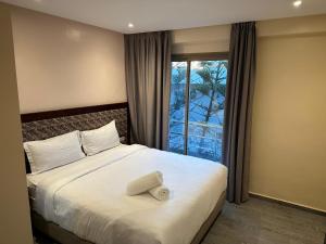 Postel nebo postele na pokoji v ubytování Oceana Mazagan Suites Hotel