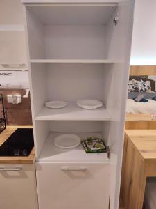 Kuhinja ili čajna kuhinja u objektu TiD Apartman LUX +9 fotografija