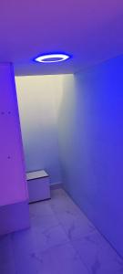 a room with a purple ceiling with a box in it at Al Khaleez Accommodation in Dubai