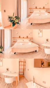 Habitación con 2 camas y mesa. en Hotel La Casona del Desierto, en Huasco