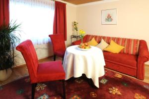 Uma área de estar em Scheffer's Hotel