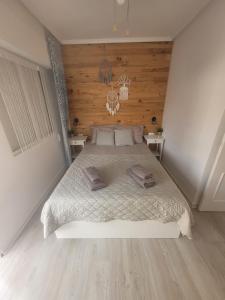 Łóżko lub łóżka w pokoju w obiekcie Przytulny Apartament 100m od plaży