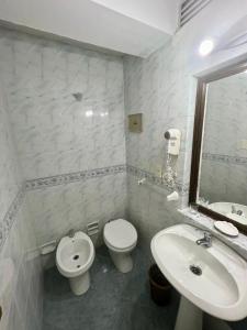 Um banheiro em Hotel Peninsula