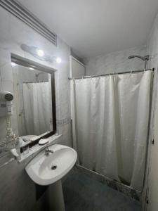 Um banheiro em Hotel Peninsula