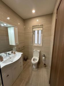 Koupelna v ubytování Orchidea Appartment + 4 fotografie