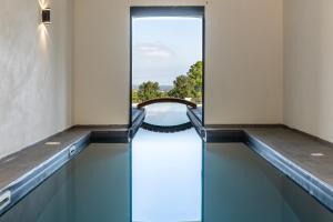 The swimming pool at or close to Mas Sureda - Evasion luxueuse avec vue panoramique
