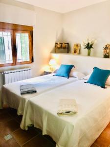 Postel nebo postele na pokoji v ubytování Nueva Cazorla Mirador Cerro del Escribano
