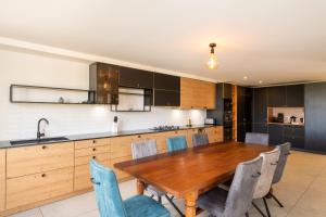 A kitchen or kitchenette at Mas Sureda - Evasion luxueuse avec vue panoramique
