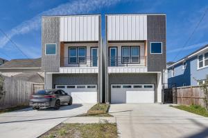 a car parked in front of a house at Houston Retreat with Balcony, 1 Mi to Toyota Center! in Houston