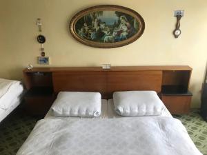 Postel nebo postele na pokoji v ubytování Retro