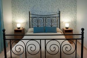 Ένα ή περισσότερα κρεβάτια σε δωμάτιο στο El puntazo del Tajo +16 φωτογραφίες