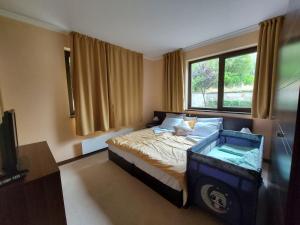 Postel nebo postele na pokoji v ubytování Terra complex -D6 - Balkan private apartment-Spa Sking Golf and Relax + 37 fotografií