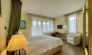 Rúm í herbergi á Hotel Movieworld