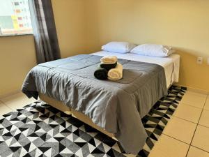 Кровать или кровати в номере Kitnet no coração de Serra Negra