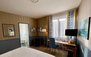 TV a/nebo společenská místnost v ubytování Hotel Movieworld