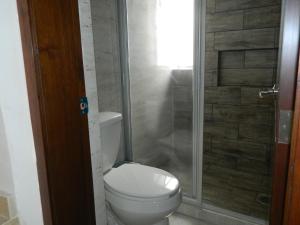 Baðherbergi á ACL Suites