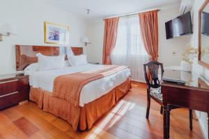 Katil atau katil-katil dalam bilik di Orly Suites