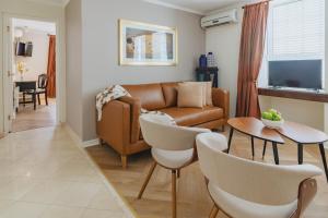 Televisyen dan/atau pusat hiburan di Orly Suites