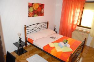 Posteľ alebo postele v izbe v ubytovaní Holiday Home Villa Margherita