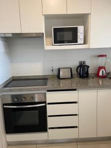 Nhà bếp/bếp nhỏ tại Departamento Río Valdivia +13 ảnh