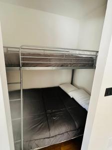 Двухъярусная кровать или двухъярусные кровати в номере Casa Amanda