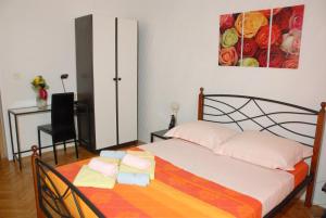Posteľ alebo postele v izbe v ubytovaní Holiday Home Villa Margherita