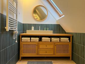 a bathroom with a sink and a mirror at Inn Het Nest in Amsterdam +21 photos