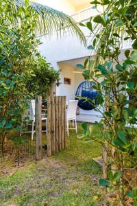 Zahrada ubytování Casa pé na areia no Tree Bies