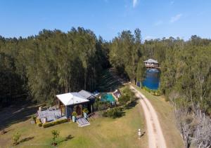 an aerial view of a house with a swimming pool at Sweetacres Hunter Valley in Pokolbin