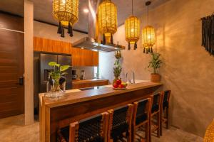 Kuchyň nebo kuchyňský kout v ubytování Luz de Luna Tulum Villa II