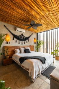 Postel nebo postele na pokoji v ubytování Luz de Luna Tulum Villa II