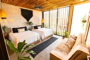 Postel nebo postele na pokoji v ubytování Luz de Luna Tulum Villa II