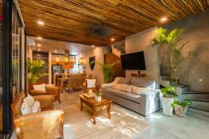 Posezení v ubytování Luz de Luna Tulum Villa II
