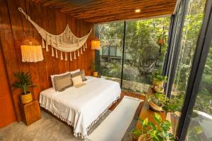 Postel nebo postele na pokoji v ubytování Luz de Luna Tulum Villa II