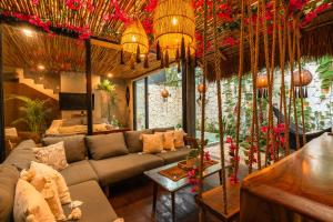 Posezení v ubytování Luz de Luna Tulum Villa II