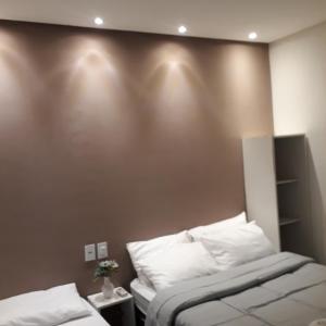 Pousada Caribe Milagrense客房内的一张或多张床位